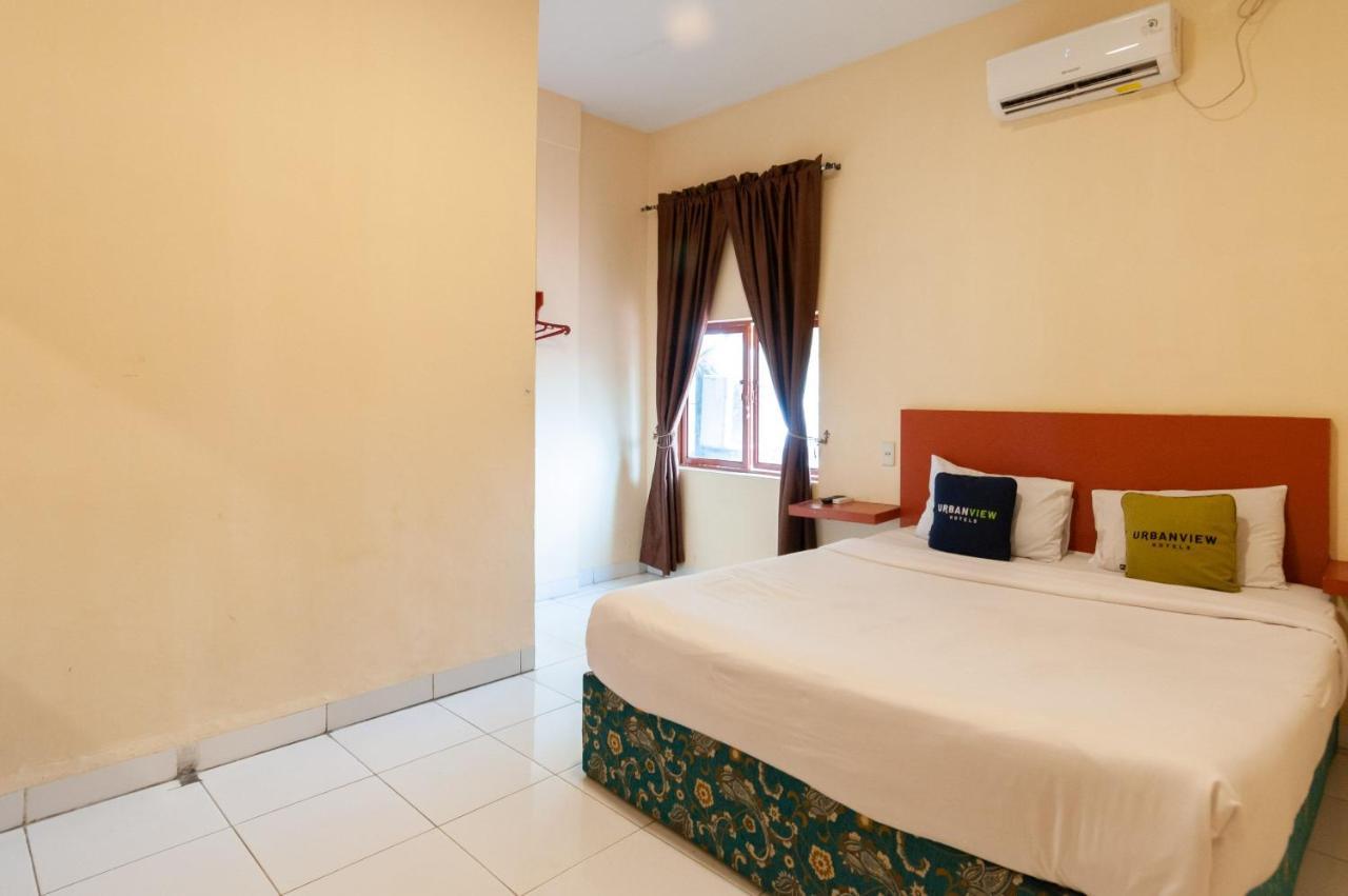 Urbanview Hotel Syariah Residence Medan Bagian luar foto