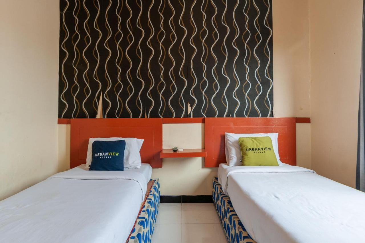 Urbanview Hotel Syariah Residence Medan Bagian luar foto